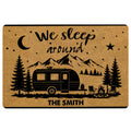 Camping doormat with camper, mountain landscape, pine trees, campfire, crescent moon, and starry night design