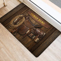 Western cowboy doormat placed at an entrance with saddle and lasso artwork