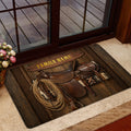 Rustic cowboy doormat styled inside a home entryway near a glass door