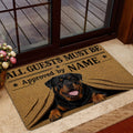 Rottweiler doormat styled at a home entrance beside a glass door and indoor flooring