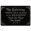 Black Wicca doormat with gothic lettering, crescent moons, pentagram, and ornate silver border