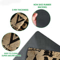 Close-up feature view showing the camping artwork, felt top surface and rubber-backed doormat