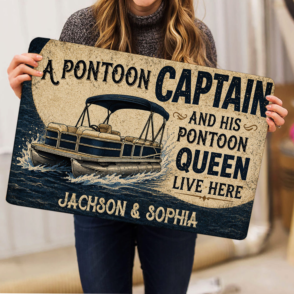 Pontoon boat doormat held indoors, showing vintage artwork, illustrated waves and nautical lettering