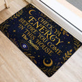 Dark blue and gold evil eye entryway rug displayed beside a bright doorway with celestial details