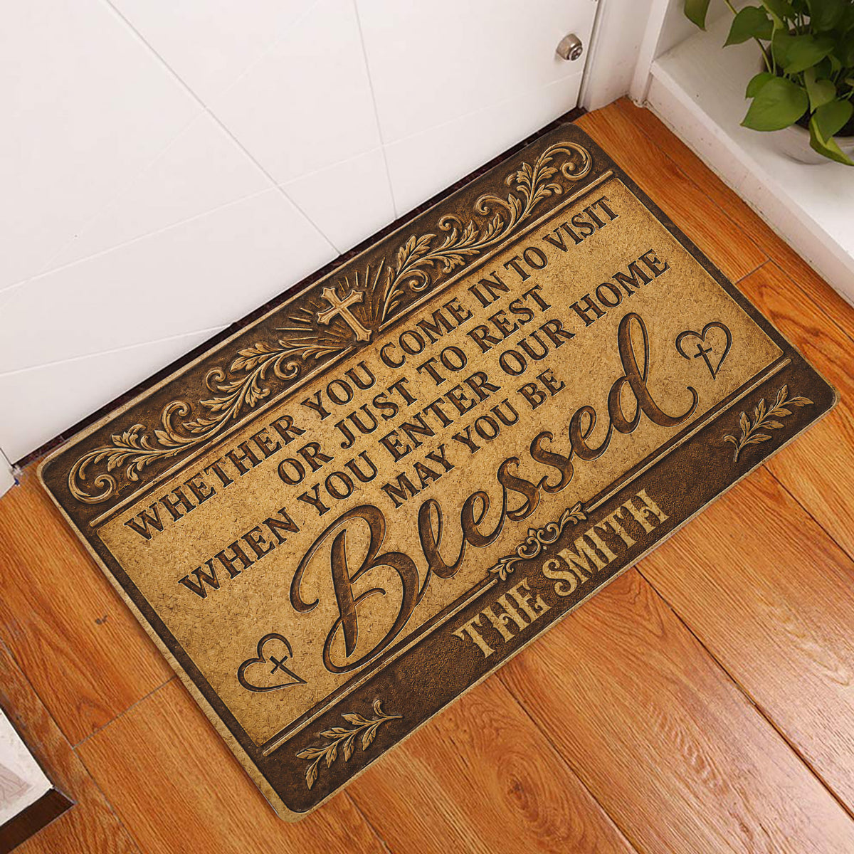 Christian Blessed doormat displayed at a home entryway beside a white door and wood flooring