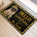 Pug Hello Sunshine entryway rug styled beside a doorway on light wood flooring