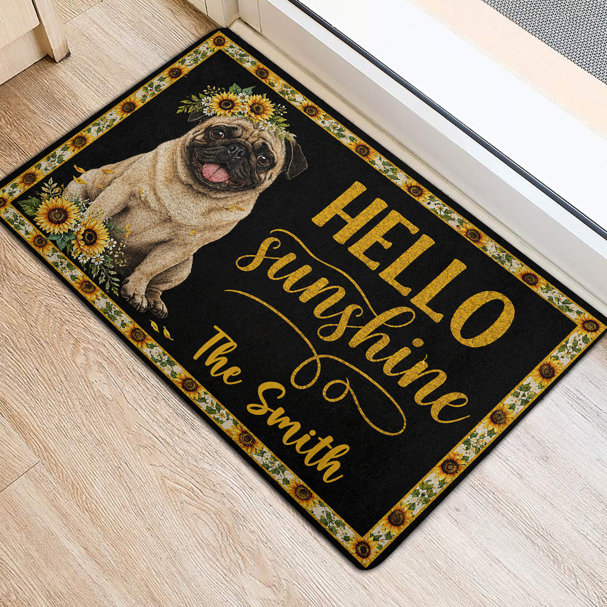 Pug Hello Sunshine entryway rug styled beside a doorway on light wood flooring