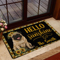 Sunflower pug welcome doormat presented in a bright home entrance near glass doors