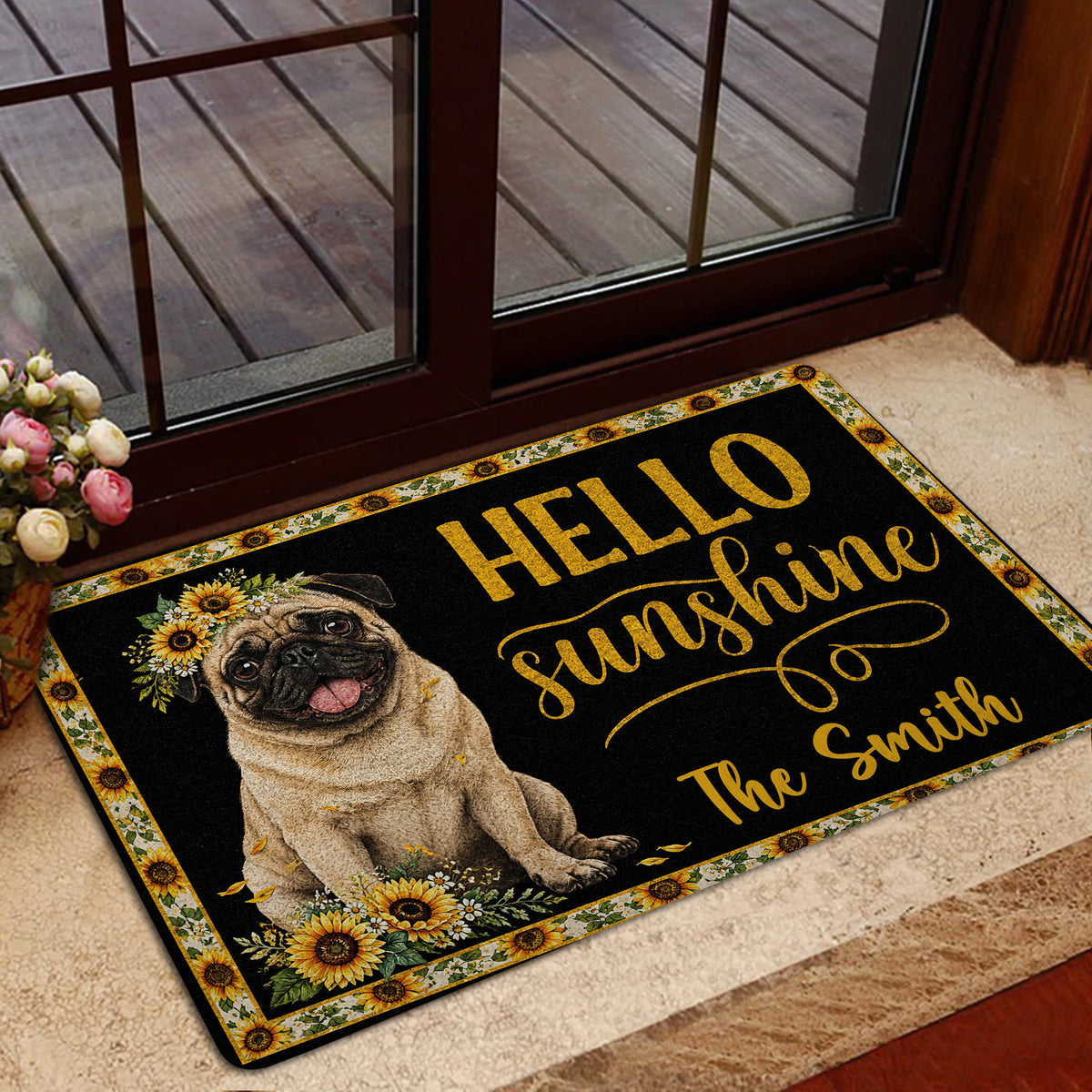 Sunflower pug welcome doormat presented in a bright home entrance near glass doors