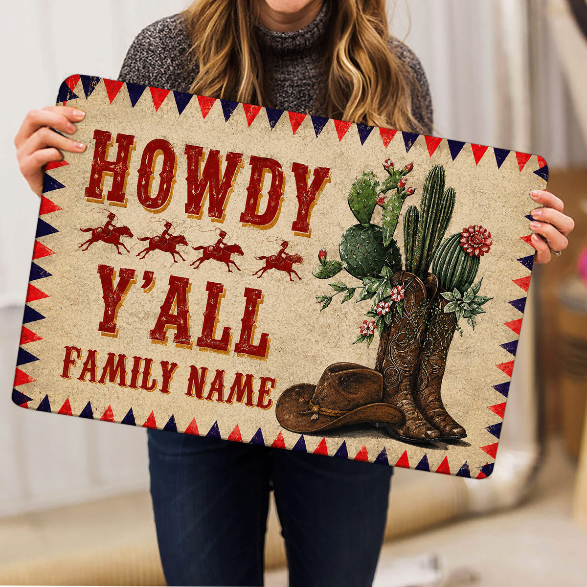 Western cowboy doormat held indoors, featuring cactus, cowboy boots, hat, horseback riders, and bold retro lettering