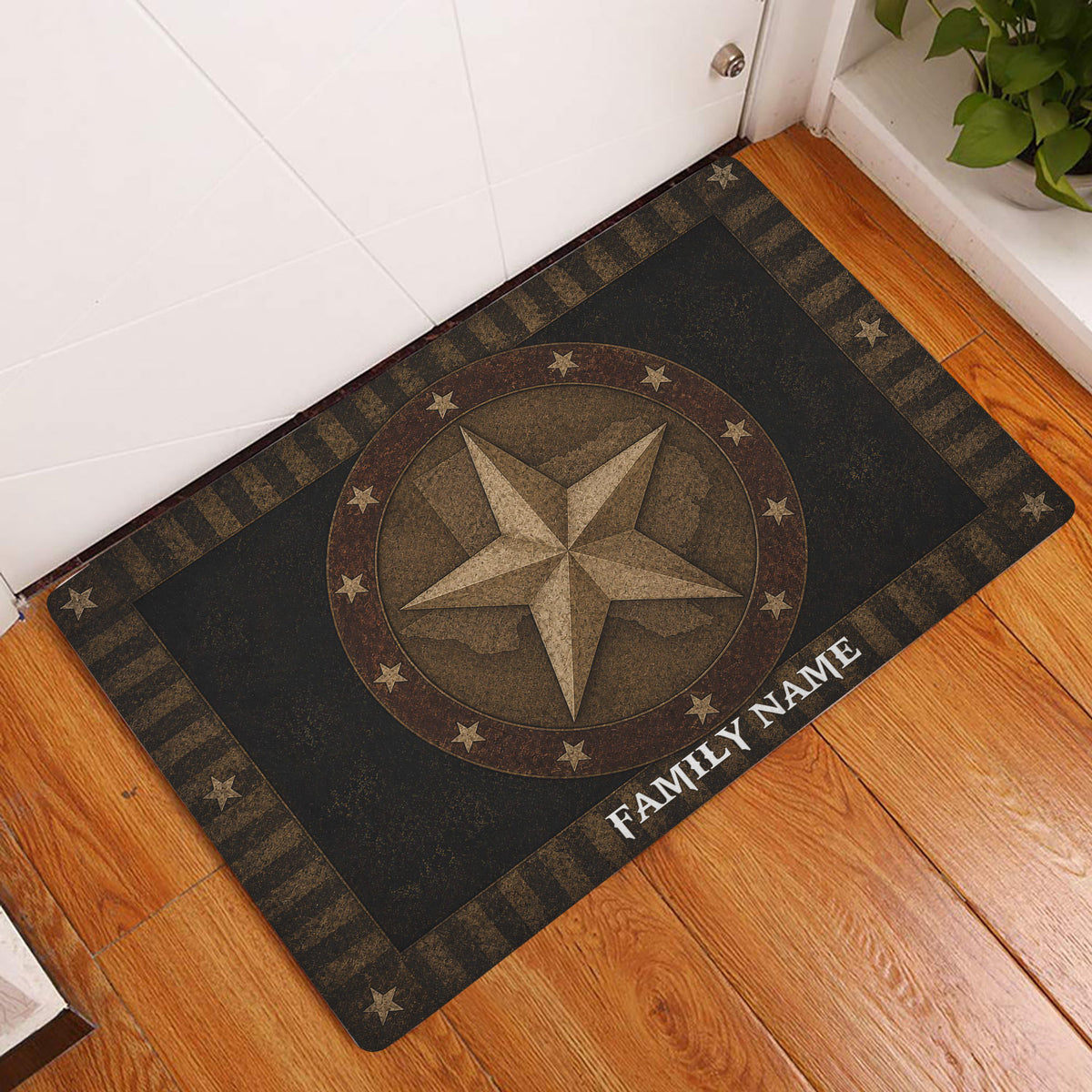 Texas star and map entryway rug displayed beside a white door on a warm wood floor