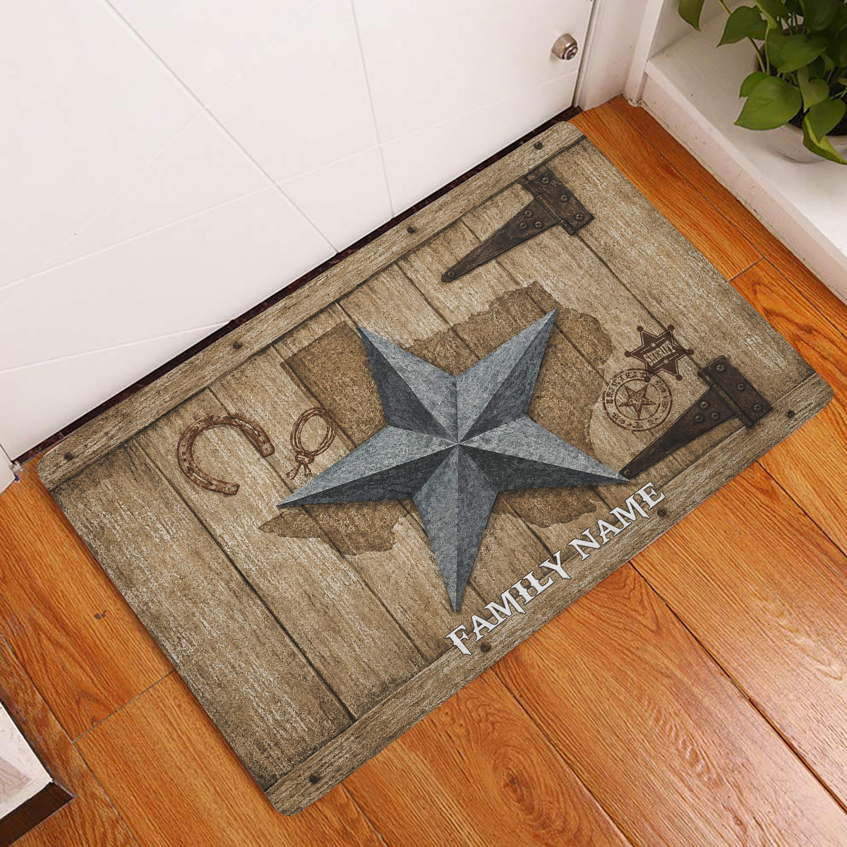 Texas western star doormat displayed at an indoor entryway beside a white door and wood floor