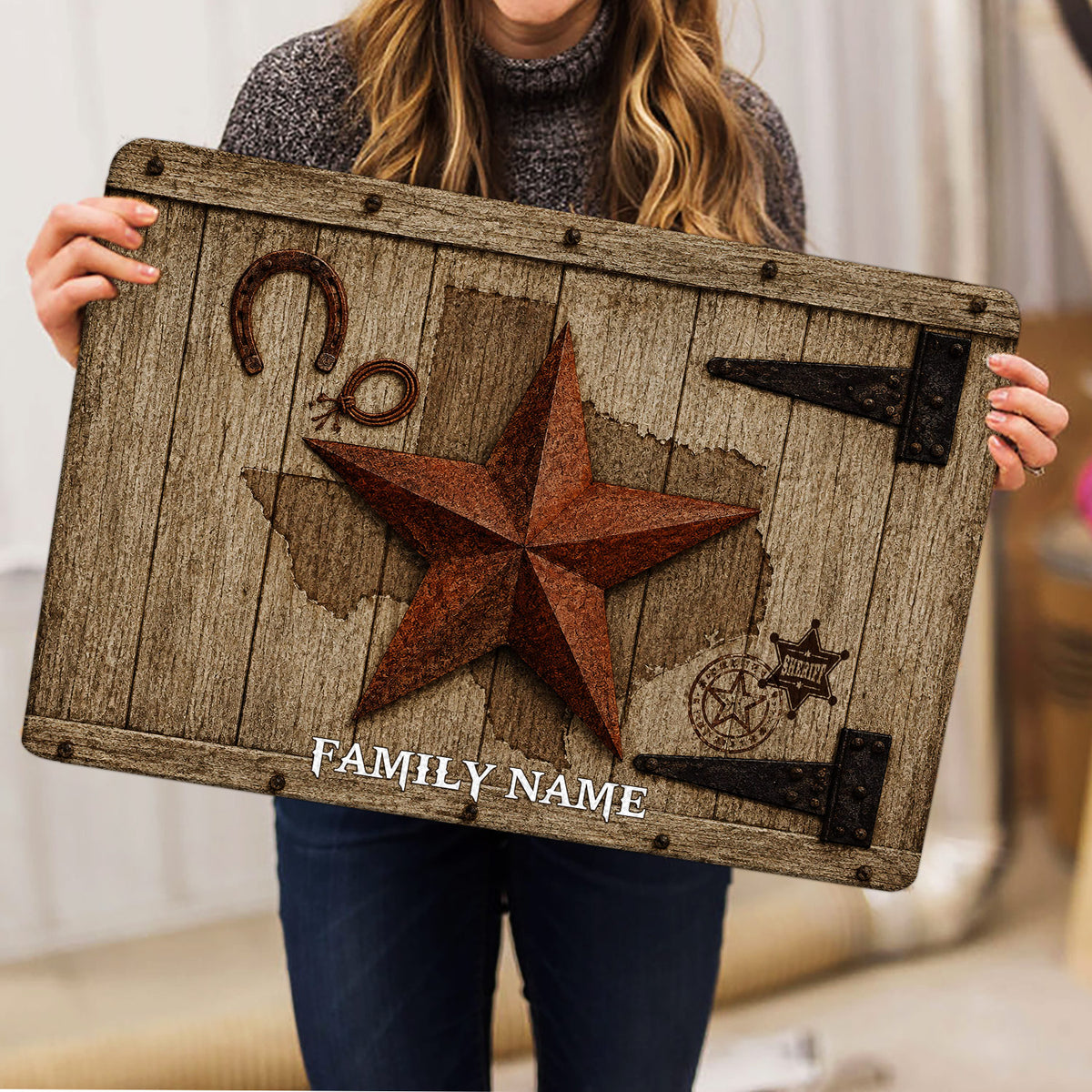Texas western doormat held indoors, showing the rustic star, horseshoe and sheriff badge design