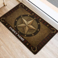 Rustic Texas star and horseshoe door mat displayed by an interior doorway on light wood flooring