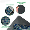 Close-up of mermaid doormat artwork and visible rubber backing with grip-focused construction details
