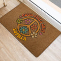 Hippie floral peace sign rug positioned beside an indoor doorway
