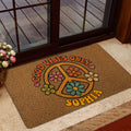 Hippie flower and peace sign doormat styled in a bright home entrance