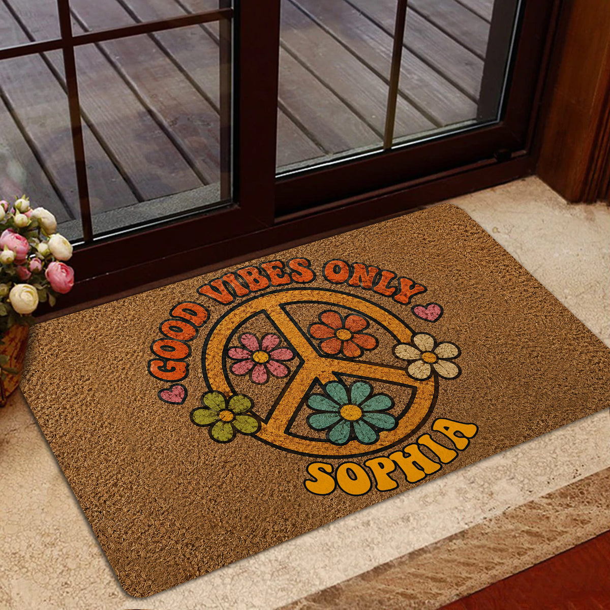Hippie flower and peace sign doormat styled in a bright home entrance