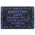 Black Wicca doormat with blue moon phases, stars, botanical flourishes, and witchy warning artwork