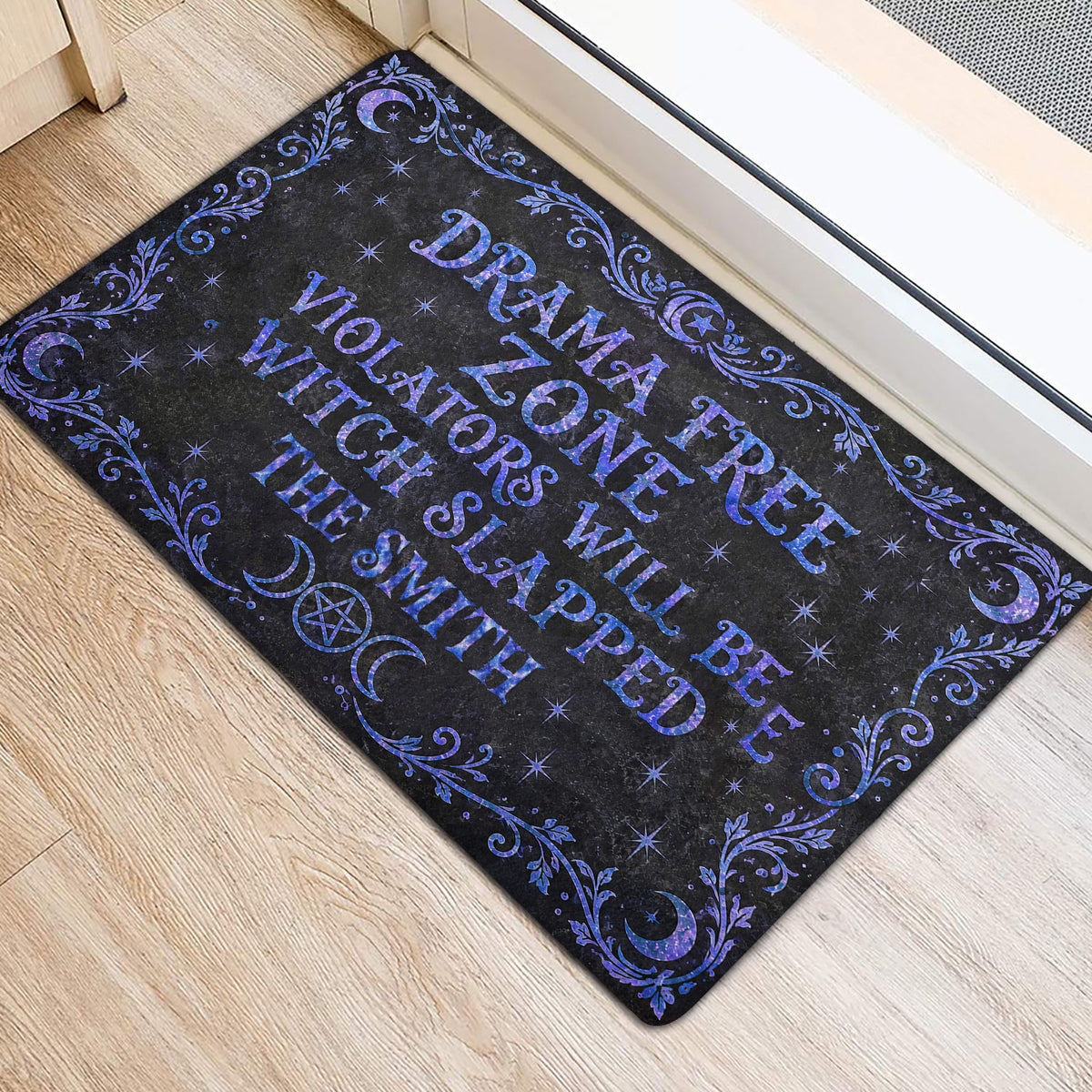 Witchy Wicca door mat positioned at an entrance with purple-blue celestial artwork and ornate border