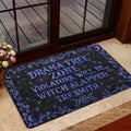 Wicca entryway rug displayed by a glass door with moon phase, star, and botanical design