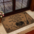 Wicca door mat in a home entrance featuring elemental witchcraft artwork and ornate black details
