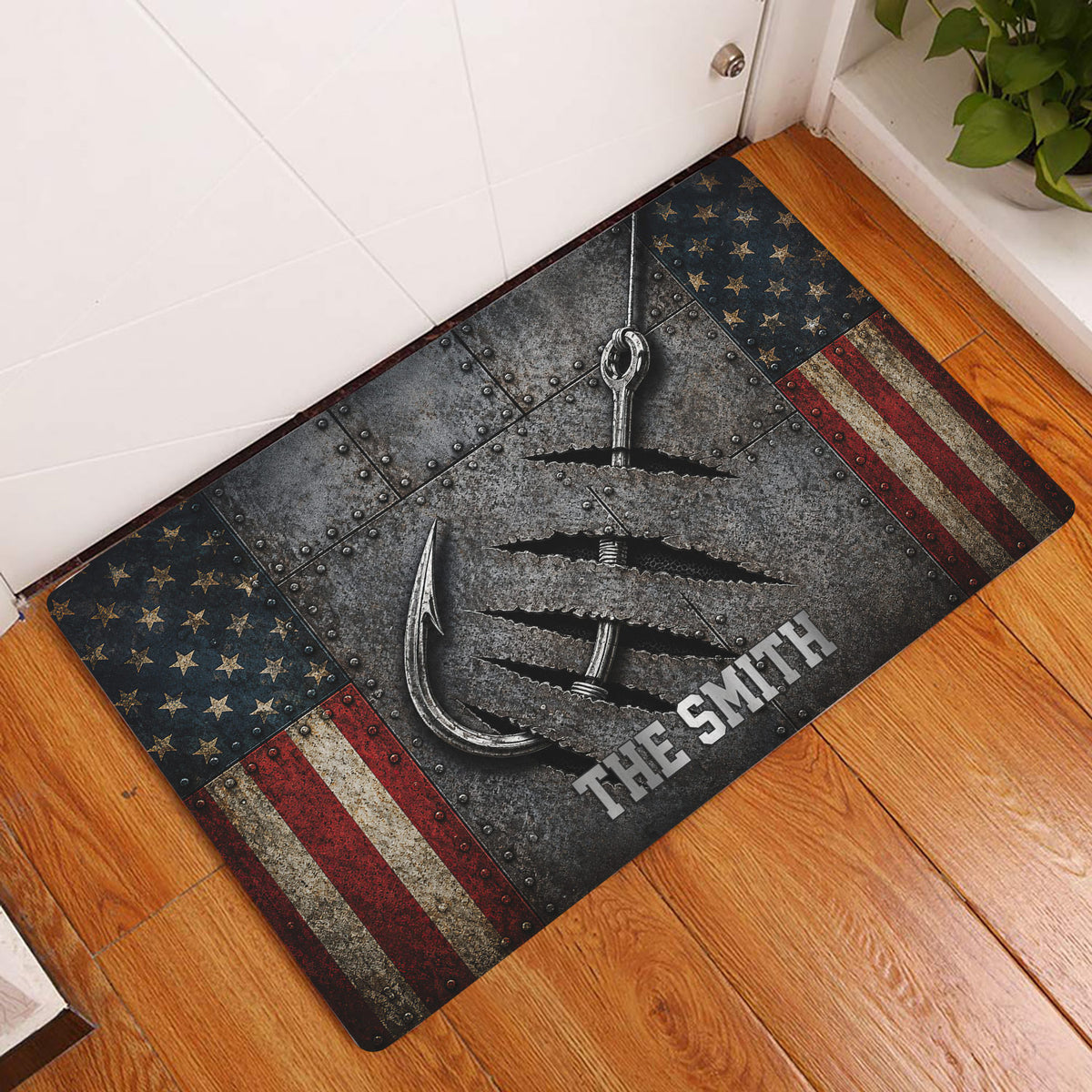 Fishing-themed doormat displayed in an entryway on a wood floor with a large hook and patriotic border