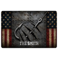 Fishing-themed doormat with crossed hooks, rugged metal texture, stars, and distressed red, white, and blue stripes
