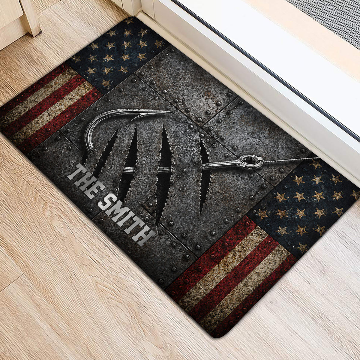Angler-inspired fishing doormat positioned near an entryway, featuring hooks, stars, and vintage flag stripes