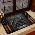 Fishing-themed door mat styled inside a home entrance with crossed hooks and distressed patriotic colors