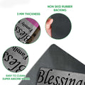 Close-up feature view showing the printed breast cancer ribbon doormat and its black rubber backing