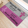 Pink and gray breast cancer ribbon door mat styled at an indoor entrance