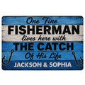 Blue fishing doormat with rustic wood texture, fishing hooks, and bold fisherman-themed lettering