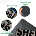 Close-up feature view showing the fishing doormat surface, rubber backing, and rounded edge
