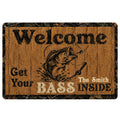 Fishing doormat with a vintage woodgrain design, leaping fish illustration, fishing rod, and welcome message