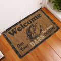 Fishing-themed doormat displayed inside an entryway on warm wood flooring