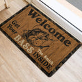 Fishing doormat placed near an interior doorway with a leaping fish and rustic woodgrain artwork