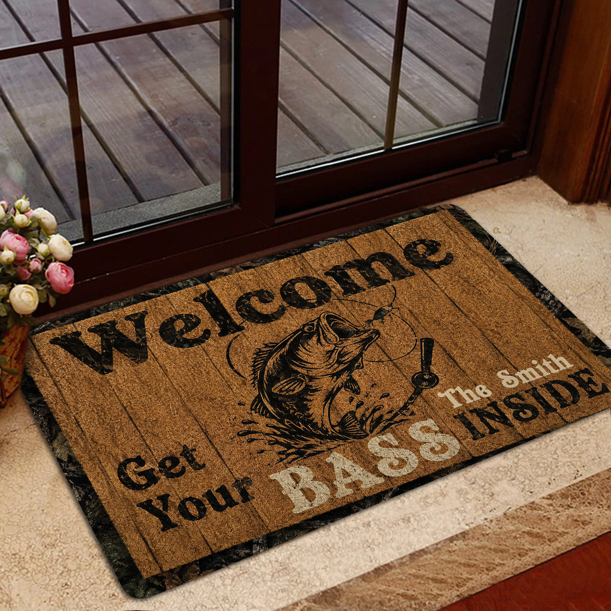 Rustic fishing doormat styled in a home entrance beside a glass door