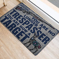 Hunting-themed front door mat with rifle, deer artwork, and bold typography in a home entryway