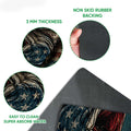 Close-up detail of the fishing doormat print, edge thickness, and dark rubber backing