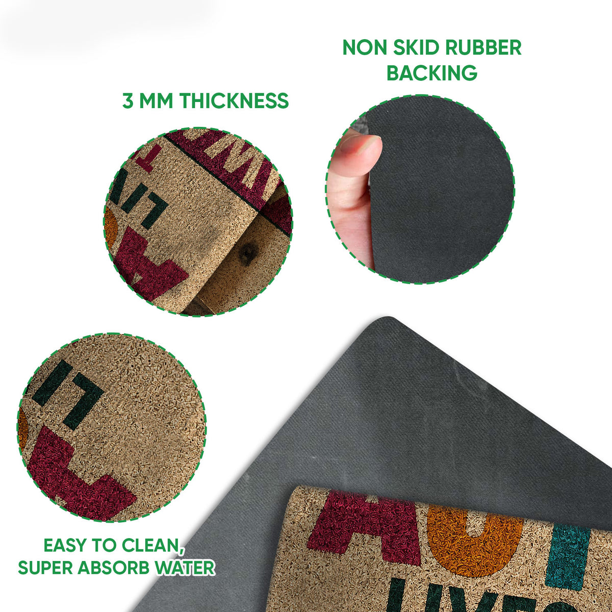 Close-up feature view of autism awareness doormat surface, rubber backing, rounded edge, and layered construction