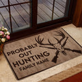 Hunting doormat with deer skull artwork styled inside a home doorway near a glass door