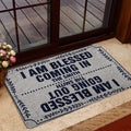 Christian welcome doormat styled in an indoor entrance with glass doors, wood trim, and floral accents