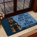 Rottweiler door mat placed at a home entrance with black and tan dog artwork and blue lettering