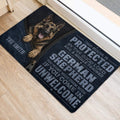 German Shepherd door mat placed beside a doorway on light wood flooring