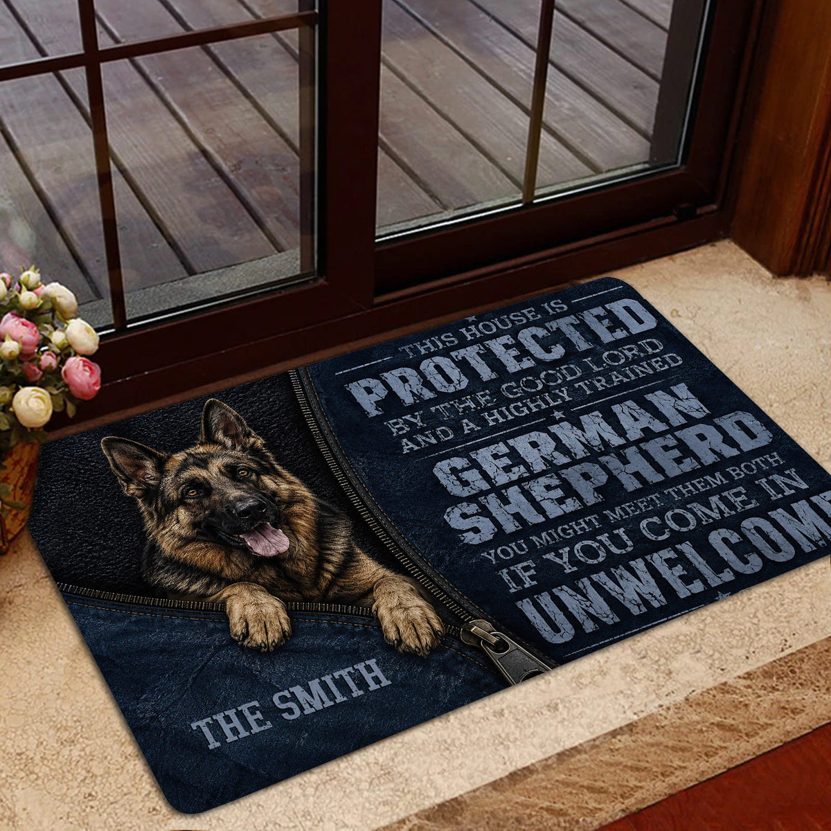 German Shepherd entryway mat displayed near a glass door with a bold protective design