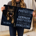 German Shepherd doormat held indoors, showing the full dog portrait and bold lettering