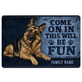 German Shepherd doormat with blue artwork, paw prints, welcome message, and family name placeholder
