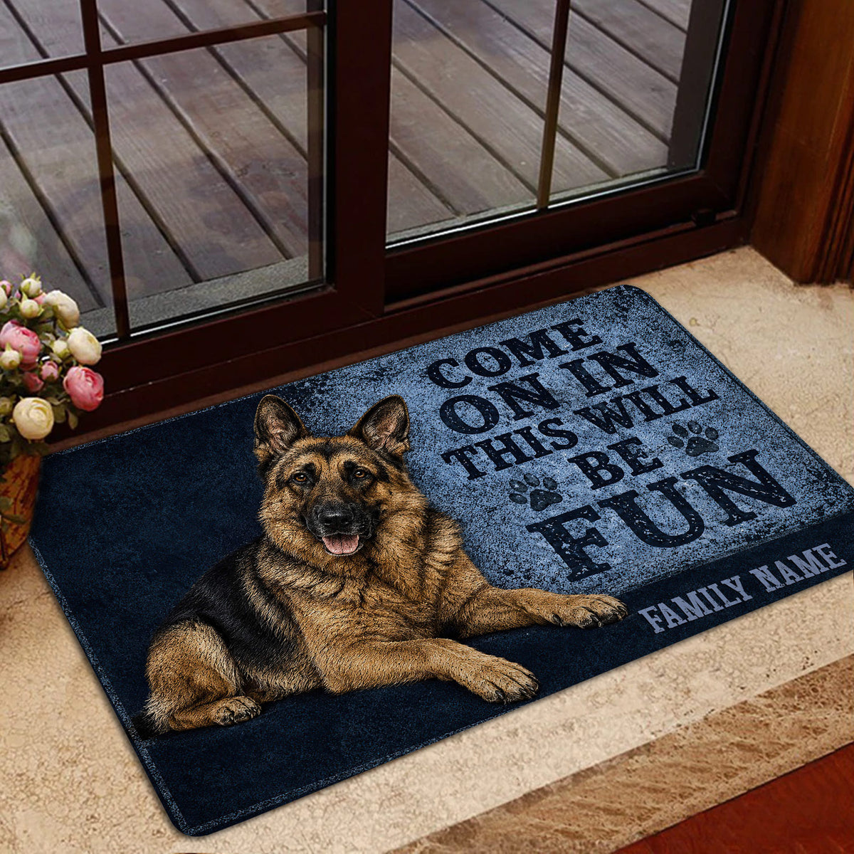 German Shepherd welcome mat positioned by a glass door in a home entryway