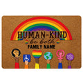 Rainbow LGBT doormat with inclusive symbols, affirming message, and family-name display area